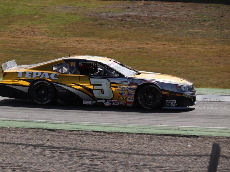 A stock-style race car on a track