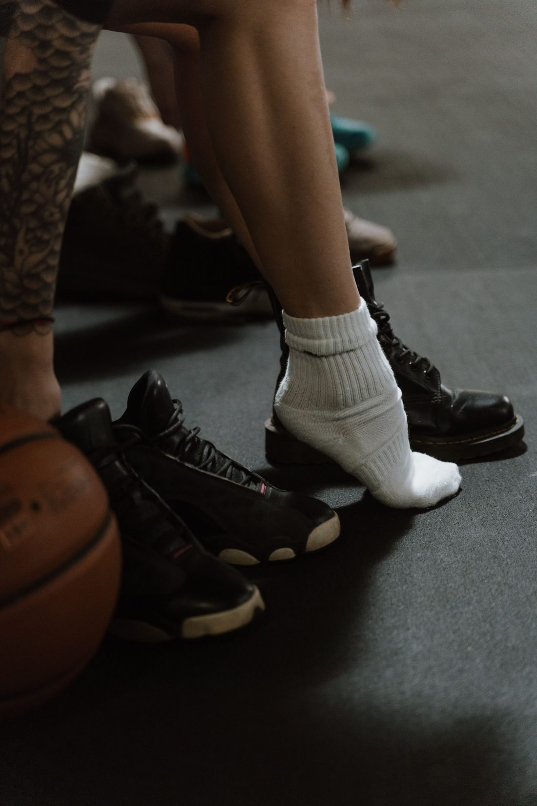 White athletic socks on an indoor court