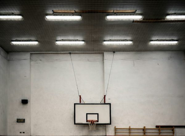 Indoor basketball court with wooden floor