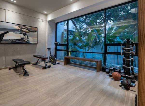 Home gym with a bench